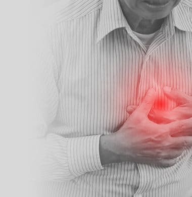 man suffering from heart palpitations after eating