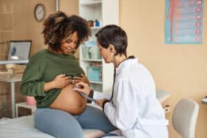 pregnant woman with her cardio OB