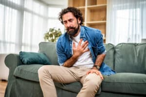 man with chest pain from a heart issue